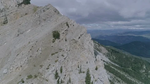 AERIAL DRON ORBIT DISCOVERING STUNNING MOUNTAIN RANGE Stock Footage 130096478