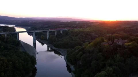 Aerial drone 4k Arno river bridge Tuscany Italy-Freccia Rossa Train Stock-Footage 250093591