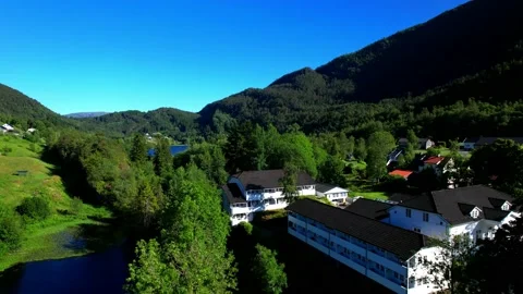 Aerial drone 4K flight view white Norway house-Fotlandsvag Village reverse Stock-Footage 200893394