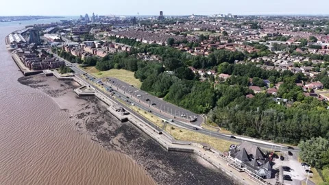 Aerial drone 4K view of Merseyside suburban housing in high sun Merseyside Видео 337833630