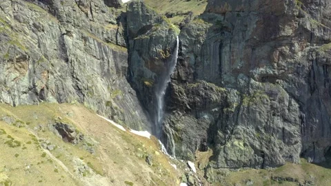 Aerial drone 4K view of Raisko Praskalo waterfall with a running rainbow Stock Footage 176714541