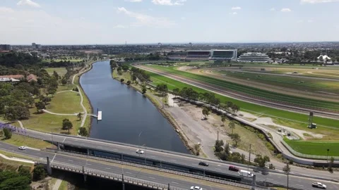 Aerial drone above river, showcasing Flemington Racecourse, Melbourne Stock Footage 309021165