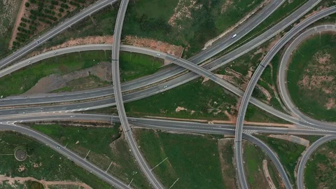 Aerial drone accent large road intersection highway from high altitude, Modern Stock Footage 121541012