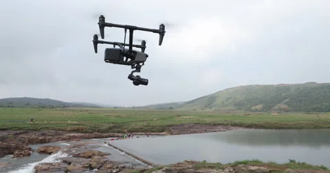 Aerial drone with an action camera Stockbeeldmateriaal 335632020