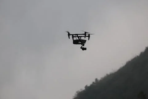 Aerial drone with an action camera Stock Photos