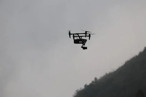 Aerial drone with an action camera Stock Photos