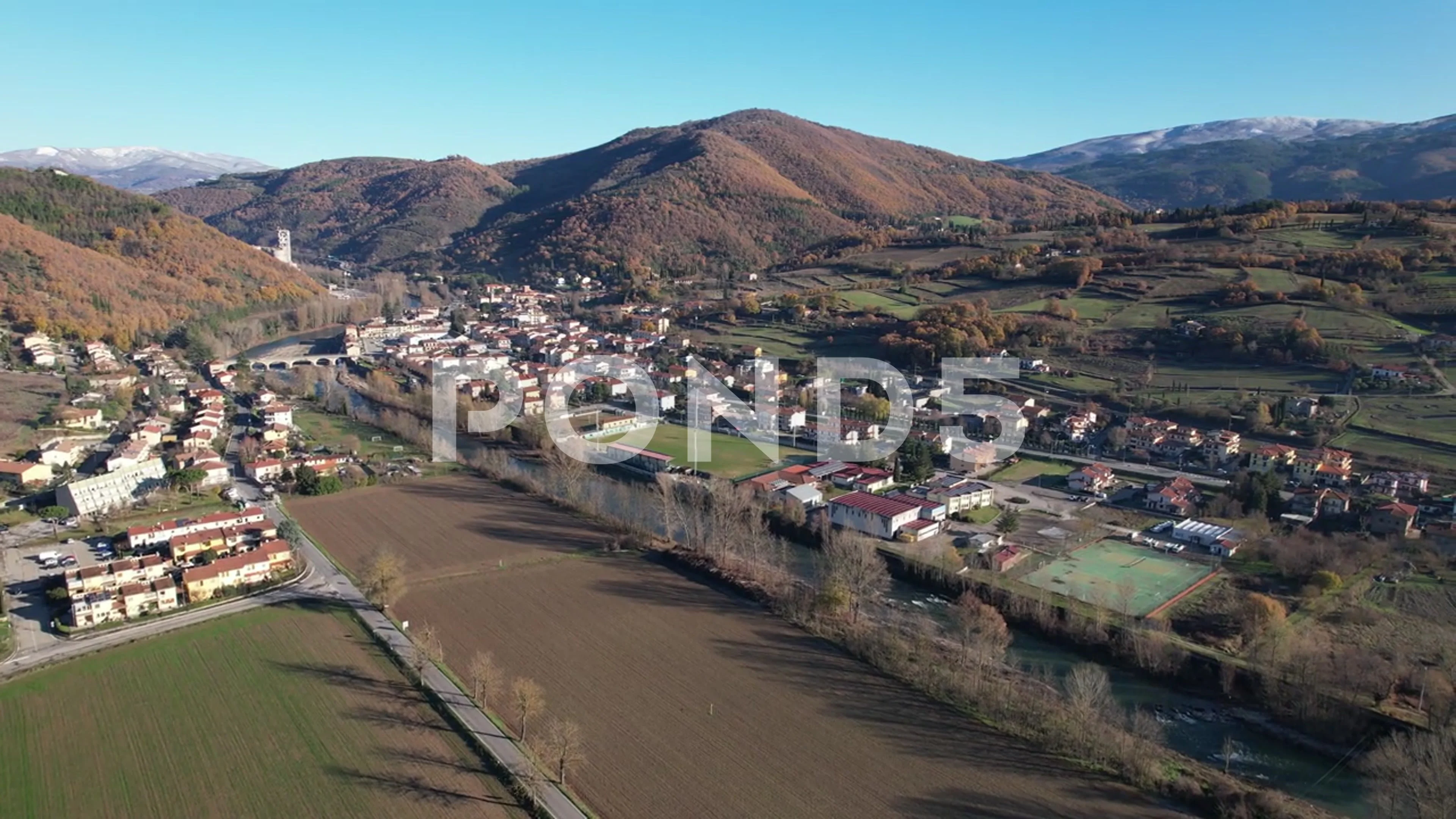 Aerial drone approach view Rassina village Casentino Tuscany Italy