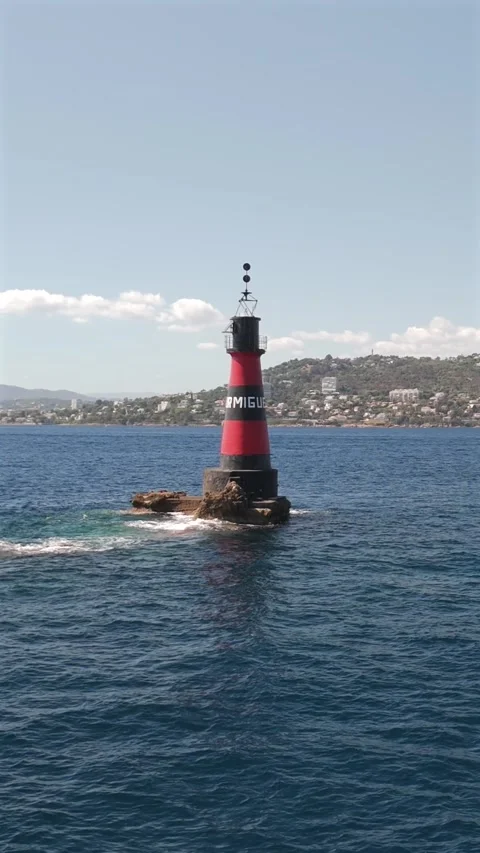 Aerial drone approaching Fourmigue rock near Antibes France.vertical Stock Footage 344751712