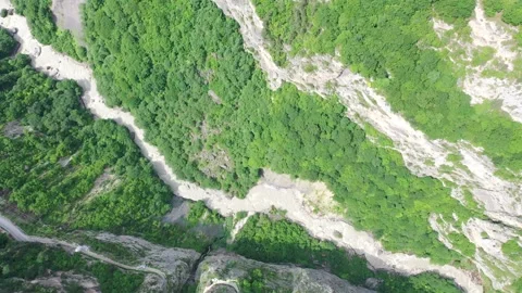 Aerial drone ascent from the deep Cherek Gorge, Caucasu Video stock 338014748