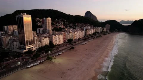 Aerial drone backwards view over Leme Beach in the Copacabana District Stock Footage 231128594