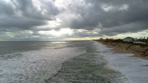 Aerial drone beach drifting down slow motion Stock Footage 102730404