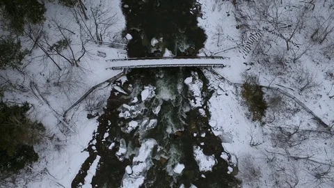 Aerial drone of the Bridge at Chittenango Falls during the Winter Stock Footage 86570972