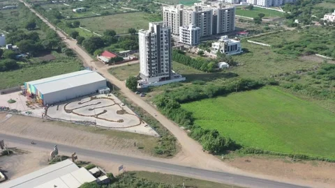 The aerial drone camera is moving to the where a large trp gamezone is visible 動画素材 259557932