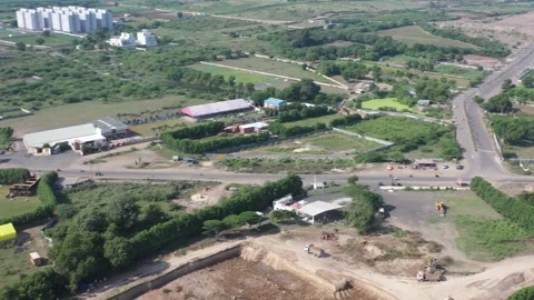 The aerial drone camera is moving to the where a large trp gamezone is visible 動画素材 259557961