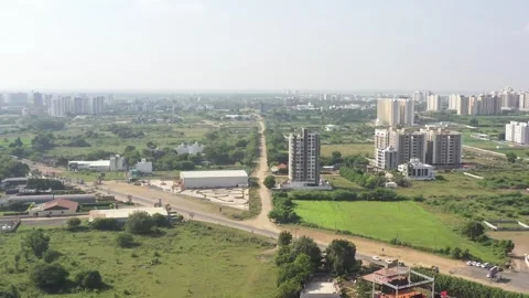 The aerial drone camera is moving to the  where a large trp gamezone is visible Stock Footage 259557977