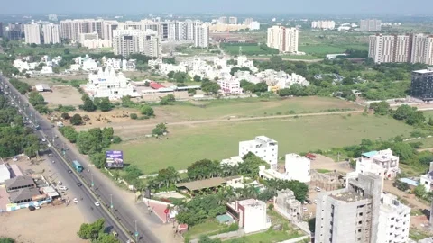 Aerial drone camera shot moving towards the side where many vehicles are visible 動画素材 259557812