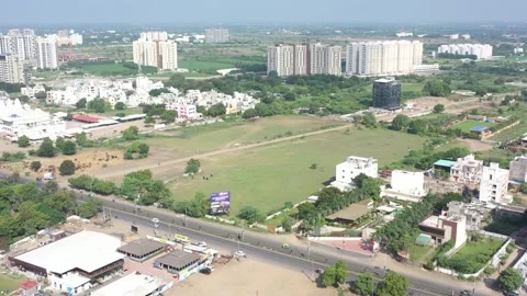 Aerial drone camera shot moving towards the side where many vehicles are visible 動画素材 259557838