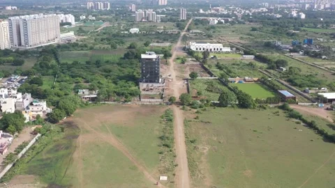 Aerial drone camera shot moving towards the side where many vehicles are visible 動画素材 259557872