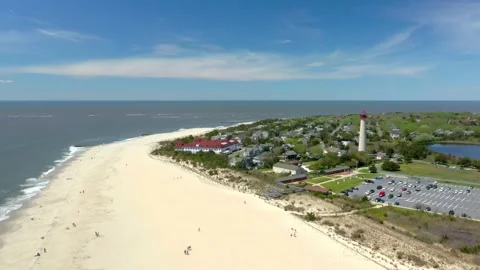 Aerial Drone of Cape May Point Lighthouse New Jersey Blue Skies Summer Stockbeeldmateriaal 141087474