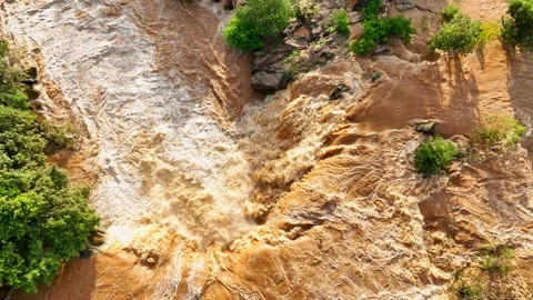 Aerial drone captures dramatic waterfall flood Stock Footage 251017980