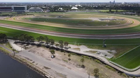 Aerial drone captures Flemington Racecourse in Melbourne on a bright summer day Stock Footage 309020643