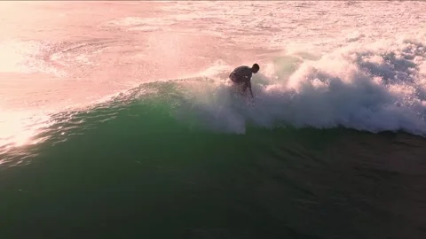 Aerial Drone Captures Powerful Reef Wave During Sunset Spectacle With Spray Stock Footage 326824301