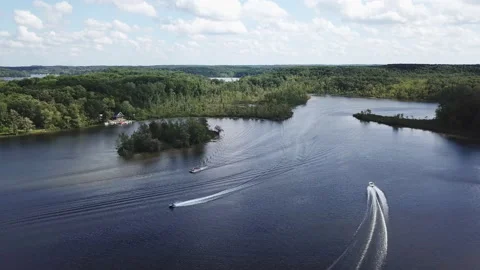 Aerial drone captures summer beauty of Pinckney Michigan chain of lakes Stock Footage 213634603