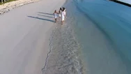 Aerial Drone Caucasian Family Enjoying A Beach Vacation Stock Footage