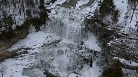Aerial drone of Chittenango Falls during the Winter Stock Footage 86571595