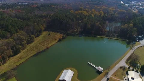 Aerial drone circle mid size green lake Stock Footage 170455429