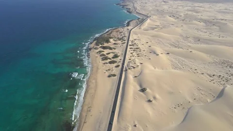 Aerial drone clip of desertic coastline Fuerteventura, Canarias. Stock Footage