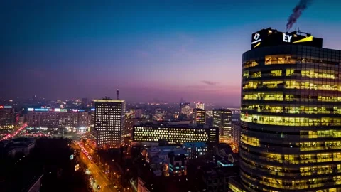 Aerial drone close up view of Bucharest city skyline Victory Square at dusk Stock Footage 131235789
