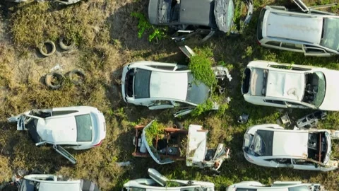Aerial drone close-up view of a crowded car scrapyard. Stock Footage 330777078