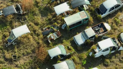 Aerial drone close-up view of a crowded car scrapyard. Stock Footage 330777099