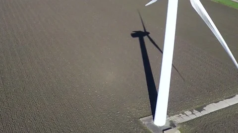 Aerial drone close up view of shadow of wind turbine windmill 4k Stock Footage 60852607