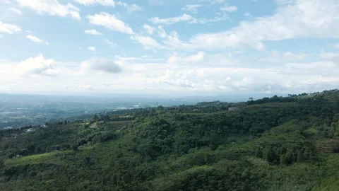Aerial Drone Clouds Floating in Bright Blue Sky Stock Footage 308857958