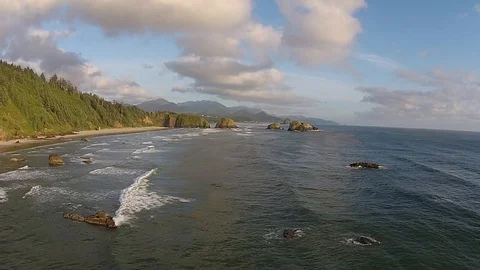Aerial Drone Clouds Over Waves Crashing on Pacific Northwest Beach, Oregon Stock Footage 101623037