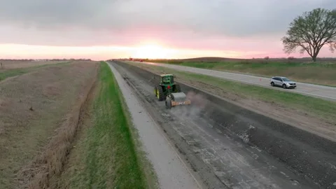 Aerial Drone Construction Road Work Iowa Breaking Asphalt Concrete Tractor Stock Footage 238578564