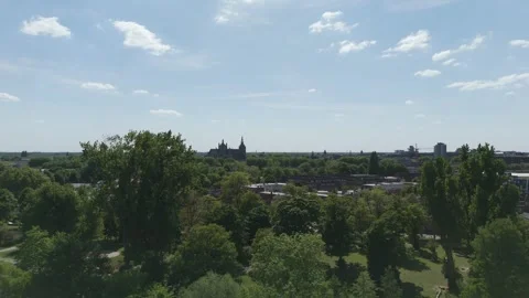 Aerial Drone Descending Pullback of Gothic European Cathedral and City Видео 308821910
