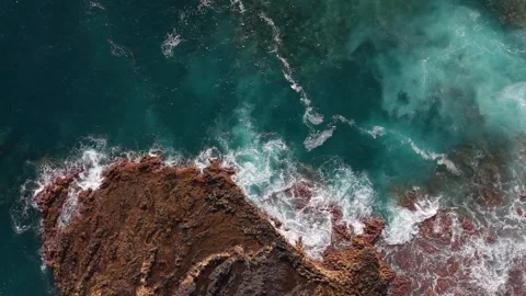 Aerial Drone Descending Toward Waves on Volcanic Lava Coast, Tenerife Stock Footage 336280337