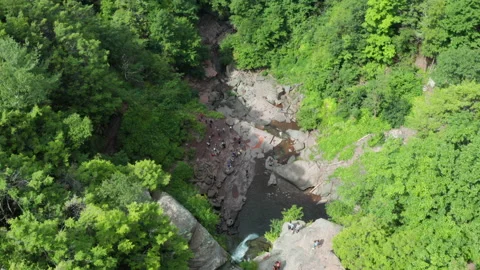 Aerial Drone Descent Over Kaaterskill Falls with Hikers, Catskills New York Stock-Footage 140763690