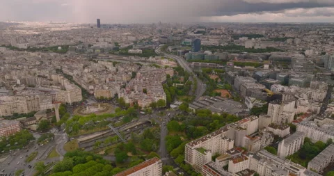 Aerial drone distant sunset Seine River bridge traffic cars driving, Paris city Stock Footage 247215404