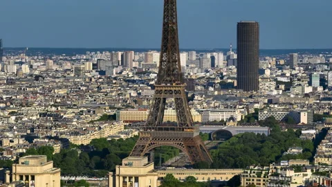Aerial drone distant sunset view of Tour Eiffel Tower and Seine River bridge Stock Footage 204079839
