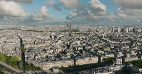 Aerial drone distant sunset view of Tour Eiffel Tower and Seine River bridge Stock Footage 204079919