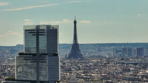 Aerial drone distant sunset view of Tour Eiffel Tower and skyscraper, Paris city Stock Footage 206459436