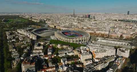Aerial drone distant sunset view of Tour Eiffel Tower and Seine River bridge 库存影片 240503518