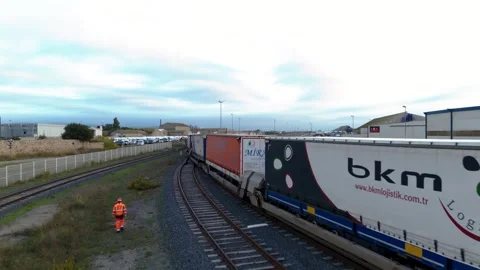 Aerial Drone Dolly In View of Cargo Train Loading Operations in Industrial Rail Stock Footage 337976111