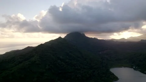 Aerial Drone during Sunset of Cloudscape over Mountains of Raiatea 10Bit Stock Footage 171605877