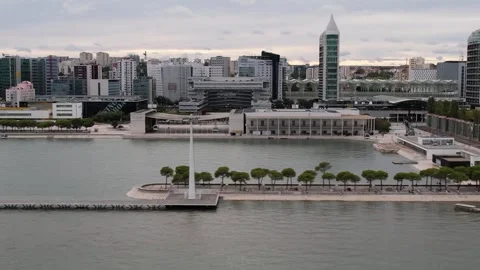 Aerial drone fast sideways panning view of Park of The Nations in Lisbon Stock Footage 249450701