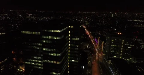 Aerial drone flight above London, uk at night. Stock Footage